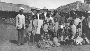 Missionary Friedrich Schad from the Basler Mission and other missionaries togethr with tribal p