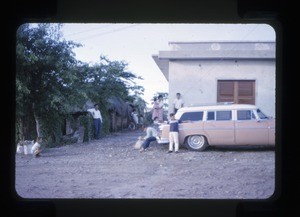 Children playing by a building