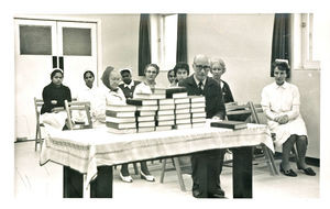 Common prayer before Bible Distribution in Bahrain- Borch Jensen at the table and missionary nu