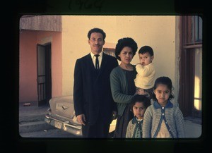 Family outside their home