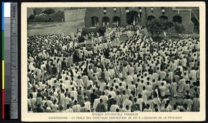 Crowd watches Corpus Christi processional, Ouagadougou, Burkina Faso, ca.1900-1930