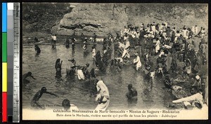 Men, women, and children bathing in Narbada River, Jabalpur, India, ca.1920-1940