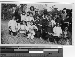 Maryknoll Sister with school children at Jiangmen, China, 1936