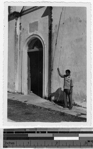 Miguas ringing the bell for catechism class, Carrillo Puerto, Quintana Roo, Mexico, ca. 1944