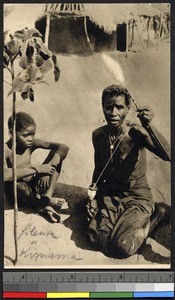 A woman spinning cotton, Kiniama, Congo, ca.1920-1940