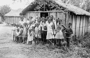 Malagasy congregation along with Gustav Søager front of their church