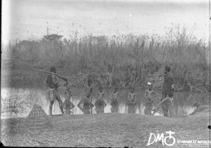 Fishing with baskets, Makulane, Mozambique, ca. 1896-1911