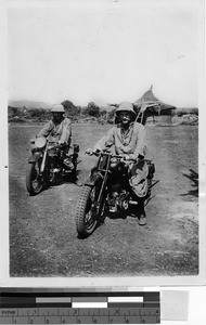 Two priests on motorcycles, Uganda, Africa, August 1941