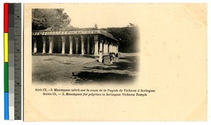 Pilgrims and a missionary by a temple, India, ca.1920-1940
