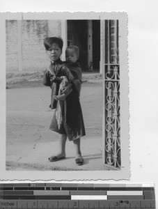 Children at the Mission door at Taishan , China, 1935