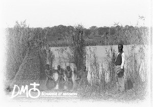 African people fishing with baskets, Makulane, Mozambique, ca. 1896-1911