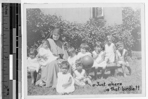 Sister M. Luke Logue, MM, with orphans at Maui Children's Home, Wailulu, Hawaii, August 1931