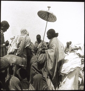 Abbess of noble blood. Woman on a journey with a 2-storey sunshade