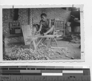 A Chinese carpenter at work at Luoding, China, 1937