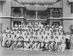 Tiruvannamalai, South Arcot District, India. The Headmaster Mr. Devanesan (with the garland), b