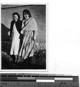 A Maryknoll Sister with one of the orphans raised at Guilin, China, 1945