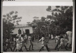 African young people celebrating Palm Sunday 1935. (The Junior School building is in the background)