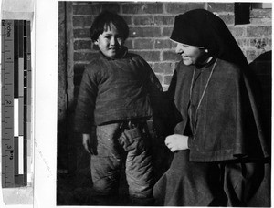 Maryknoll Sister and child, Fushun, China, 1932