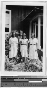 Sister Clare Miltenberger, MM, with three graduates, Heeia, Hawaii, 1932