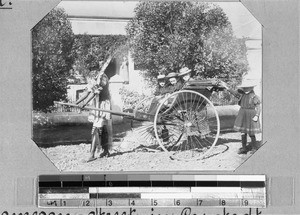 Rickshaw driver and four girls, Cape Town, South Africa