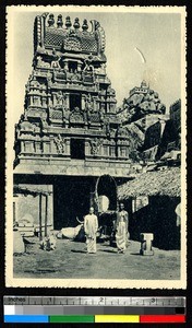 Men and cows in front of a pagoda, India, ca.1920-1940