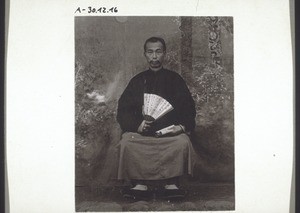 Elderly chinese man in the old costume