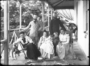 Group of Swiss missionaries on the porch of the mission house in Antioka, Mozambique, 1902