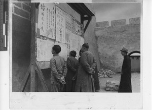 Men reading the news at Kunming, China, 1942