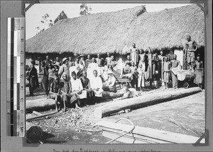 Hollan with his family and workers at the joinery, Rungwe, Tanzania, ca. 1898-1914