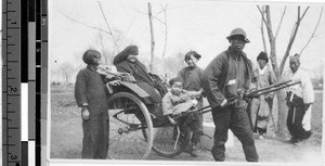 Maryknoll Sister in a rickshaw, Fushun, China, 1934