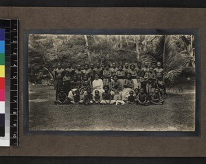 Group with missionary's wife, Mailu, Papua New Guinea, ca. 1905