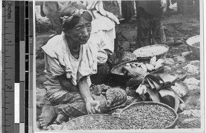 Indian woman selling food at a market, Guatemala, ca. 1949