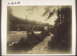 Bridge of spirits near Schong phyang, with a pagoda on the ridge above. (Len phin)