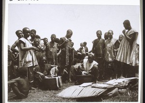 Market scene in Bamum: selling shellfish