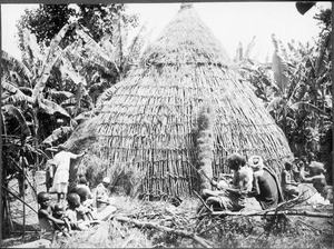 Chaga building a house, Tanzania, ca. 1911-1938