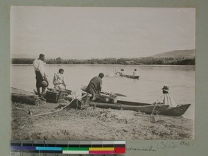 Crossing the Imania River in a lakana, Ambandromisitra, Madagascar, 1906