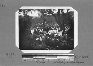 Missionary Jansa during a christening assembly, Kyimbila, Tanzania, ca. 1899-1934