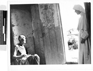 Maryknoll Sister visiting elderly gentleman, Kaying, China, ca.1920-1940