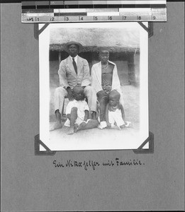 A Nyika assistant with his family, Tanzania