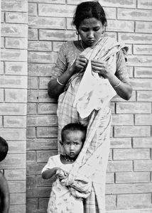 Bangladesh Lutheran Church/BLC. Participant with child from a women's workshop at Saraswatipur