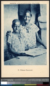 Gourounsi girls with a book, Ouagadougou, Burkina Faso, ca.1900-1930