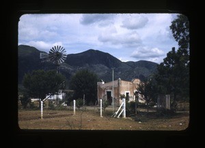 house and outbuildings