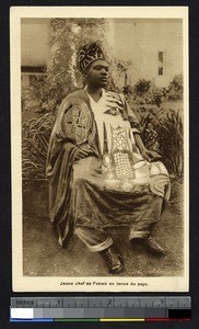 Seated chief in traditional dress, Cameroon, ca.1920-1940