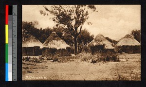 Houses with thatched conical roofs, Angola, ca.1920-1940