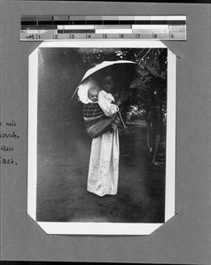 Nursemaid with the Gierschs' baby on her back, Mbozi, Tanzania, ca. 1906-1929