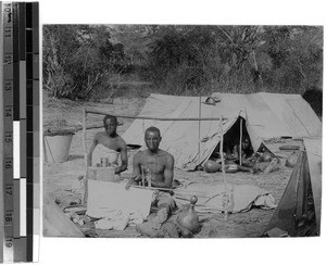 A weaver in the camp. Tents of the porters, Tanzania