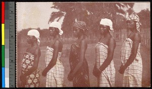 Young women standing in a line, Congo, ca.1920-1940