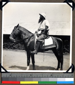 Father Sirlinger on horse, Shendam, Nigeria, 1923