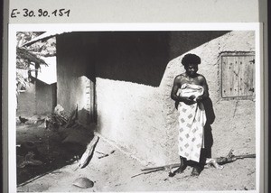 Manyemen. A patient combing her hair