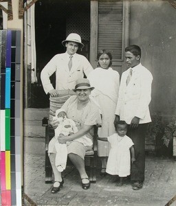 Kari and Josiah Mason together with a Malagasy family, Madagascar, ca.1934